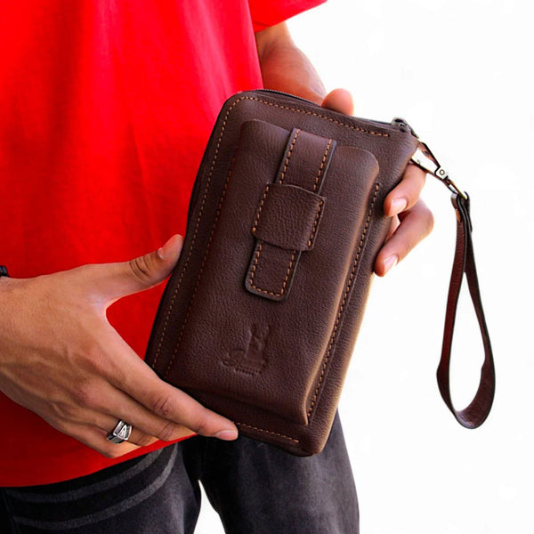 شنطة يد رجالي أنيقة من الجلد الطبيعي – متعددة الاستخدام بيد ثابتة وقابلة للإزالة.