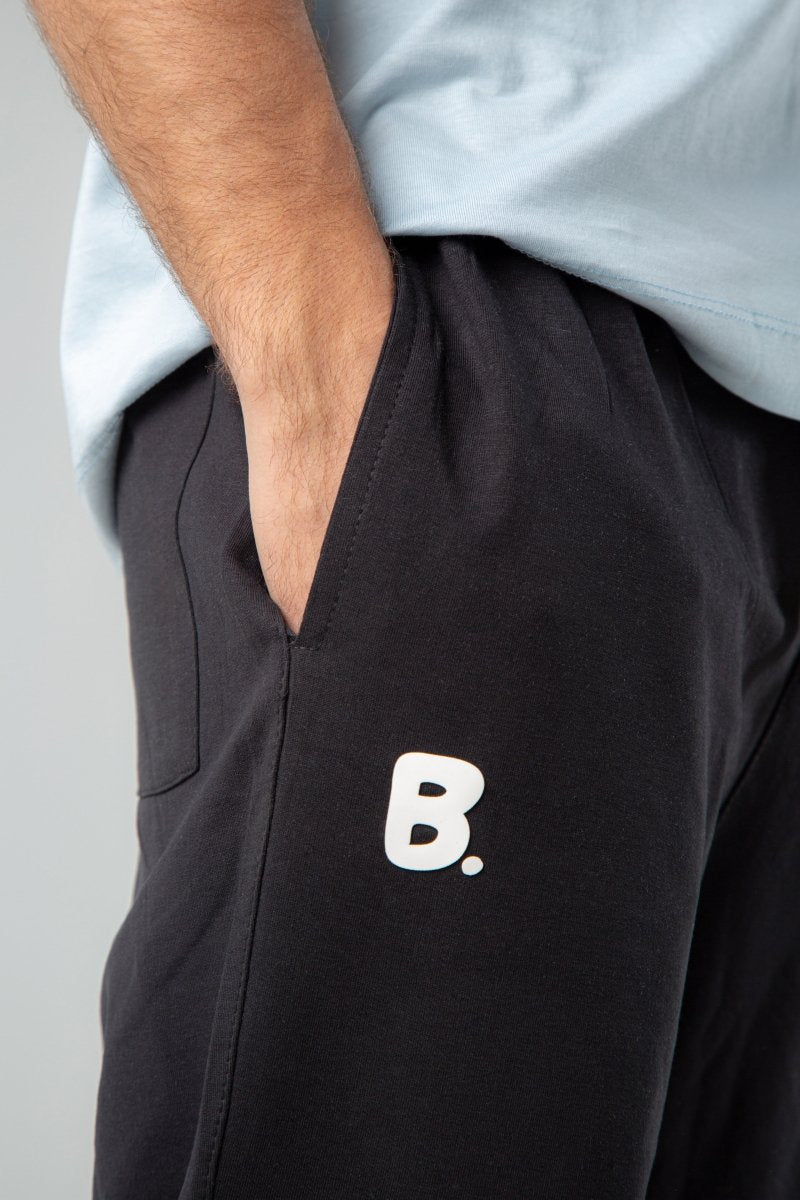 REGULAR FIT JOGGER WAIST PANTS – Black.