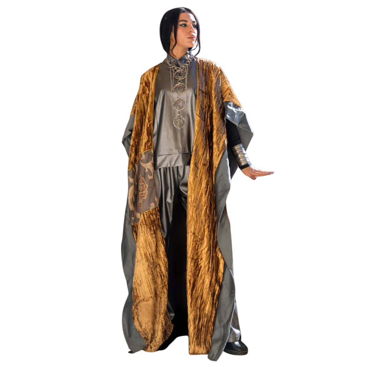 A gold velvet shawl kaftan with elegant, modern details.
